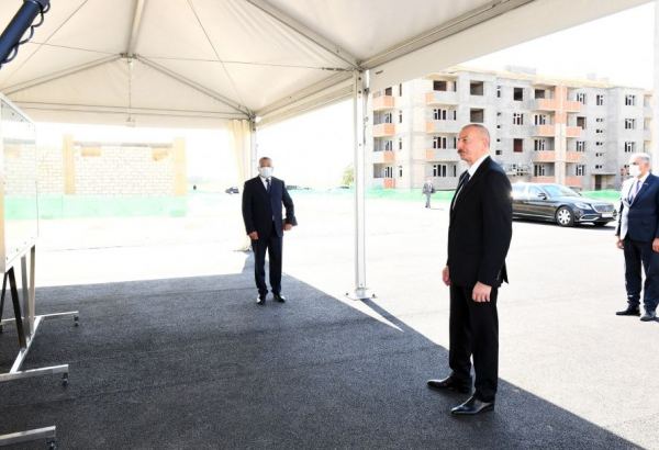 Azerbaijani president views construction of residential block built for IDPs in Samukh district (PHOTO)