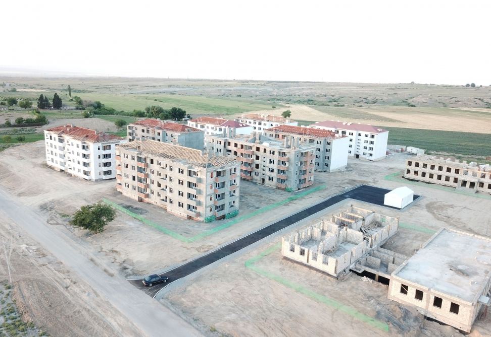Azerbaijani president views construction of residential block built for IDPs in Samukh district (PHOTO)