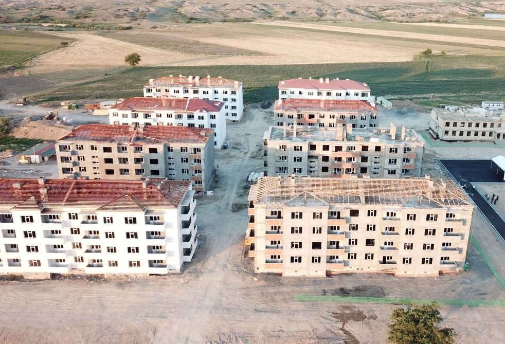 Azerbaijani president views construction of residential block built for IDPs in Samukh district (PHOTO)
