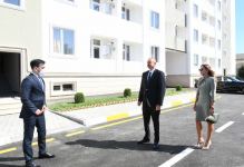 Президент Ильхам Алиев и Первая леди Мехрибан Алиева приняли участие в открытии реконструированного здания общежития в Бузовне (ФОТО) (версия 2)