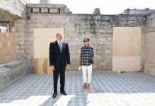 Azerbaijani president, first lady view landscaping work carried out in Balakhani settlement (PHOTO)