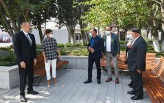 Azerbaijani president, first lady view landscaping work carried out in Balakhani settlement (PHOTO)