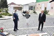 Azerbaijani president, first lady view landscaping work carried out in Balakhani settlement (PHOTO)
