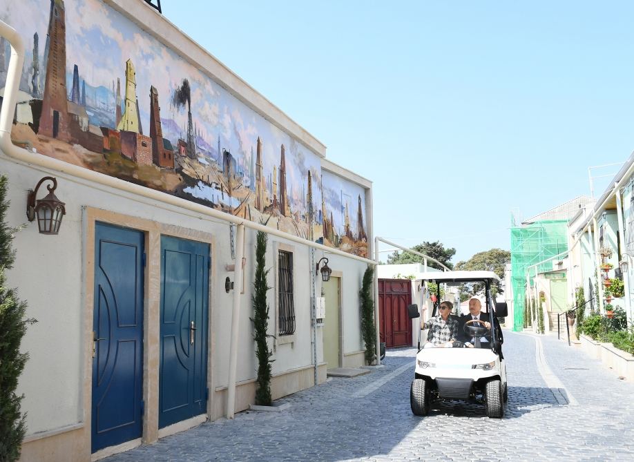 Azerbaijani president, first lady view landscaping work carried out in Balakhani settlement (PHOTO)