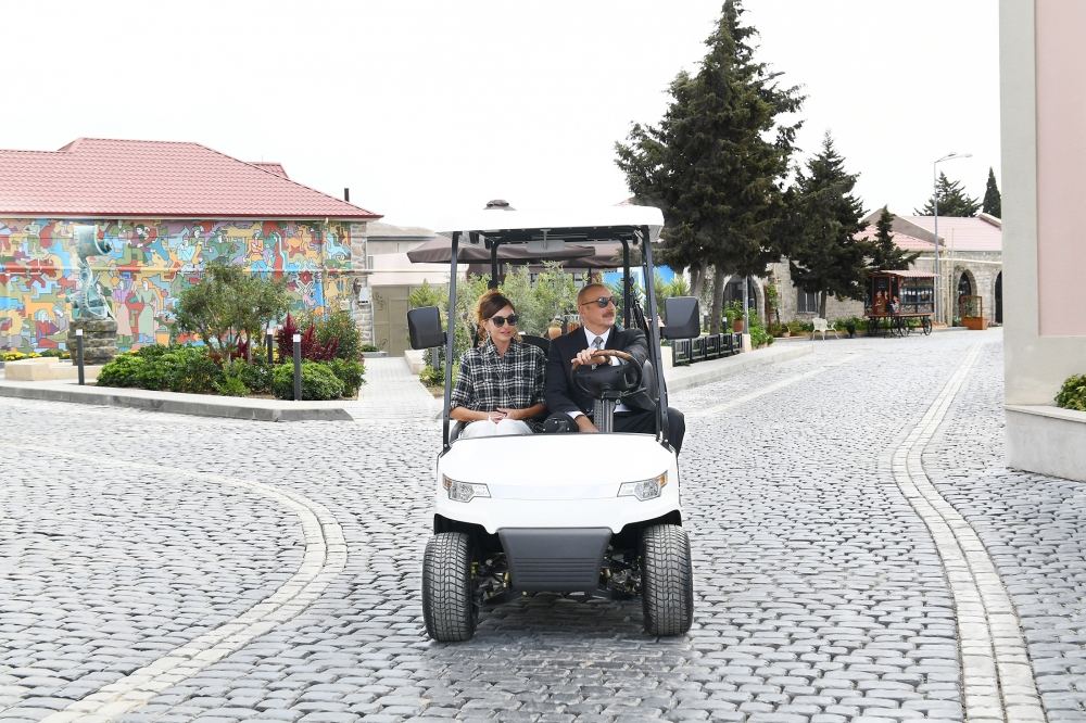 Azerbaijani president, first lady view landscaping work carried out in Balakhani settlement (PHOTO)