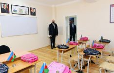 Президент Ильхам Алиев принял участие в церемонии предоставления семьям шехидов и инвалидам войны квартир в жилом комплексе в бакинском поселке Рамана (ФОТО)