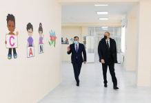 Президент Ильхам Алиев принял участие в церемонии предоставления семьям шехидов и инвалидам войны квартир в жилом комплексе в бакинском поселке Рамана (ФОТО)