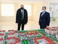 Президент Ильхам Алиев принял участие в церемонии предоставления семьям шехидов и инвалидам войны квартир в жилом комплексе в бакинском поселке Рамана (ФОТО)