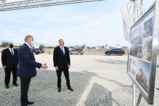 Президент Азербайджана заложил фундамент первого жилого здания, которое будет построено в городе Агдам (ФОТО) (Версия 2)