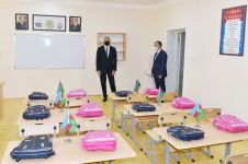 Президент Ильхам Алиев принял участие в церемонии вручения квартир и автомобилей семьям шехидов и ветеранам войны в поселке Ходжасан (ФОТО/ВИДЕО)