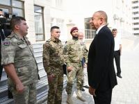 Президент Ильхам Алиев принял участие в церемонии вручения квартир и автомобилей семьям шехидов и ветеранам войны в поселке Ходжасан (ФОТО/ВИДЕО)