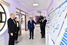 Президент Ильхам Алиев и Первая леди Мехрибан Алиева приняли участие в открытии нового жилого комплекса для семей шехидов и инвалидов войны в Сабунчинском районе Баку (ФОТО/ВИДЕО)