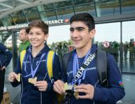 Азербайджанские гимнасты привезли в Баку из Италии медали Чемпионата Европы (ФОТО)