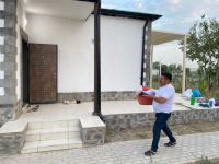 Residents of Azerbaijani Aghali village receive keys to their houses (PHOTO)