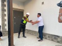Residents of Azerbaijani Aghali village receive keys to their houses (PHOTO)