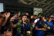Азербайджанские спортсмены-участники V Игр исламской солидарности вернулись на родину (ФОТО/ВИДЕО)