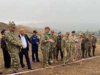 Военные атташе в Азербайджане осмотрели массовое захоронение, обнаруженное в селе Эдилли (ФОТО)