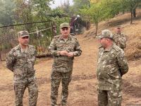 Военные атташе в Азербайджане осмотрели массовое захоронение, обнаруженное в селе Эдилли (ФОТО)