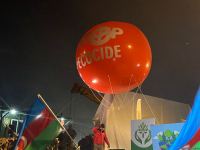Azerbaijani peaceful protesters raise big balloon with 'Stop ecocide' written on it, on Shusha-Khankandi road (PHOTO)