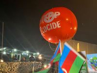 Azerbaijani peaceful protesters raise big balloon with 'Stop ecocide' written on it, on Shusha-Khankandi road (PHOTO)