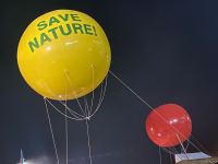 Azerbaijani peaceful protesters raise big balloon with 'Stop ecocide' written on it, on Shusha-Khankandi road (PHOTO)