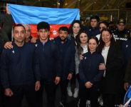 Азербайджанские спортсмены вернулись из Еревана в Баку (ФОТО)