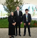 Президент Ильхам Алиев встретился с жителями, переселившимися в село Кенгерли Агдамского района, вручил им ключи от домов (ФОТО/ВИДЕО)