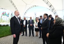 Президент Ильхам Алиев встретился с жителями, переселившимися в село Кенгерли Агдамского района, вручил им ключи от домов (ФОТО/ВИДЕО)