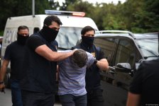 Кадры задержания сотрудников "Sputnik Азербайджан" в Баку (ФОТО/ВИДЕО)