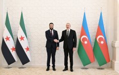 President Ilham Aliyev holds expanded meeting with Transitional President of Syria (PHOTO)
