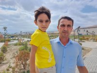 Multiple families relocating to Aghdam's Khidirli village receive keys to houses (PHOTO)