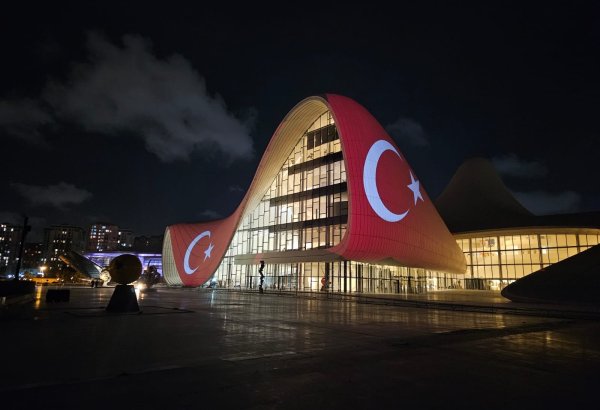 Heydar Aliyev Center illuminated in colors of Turkish flag