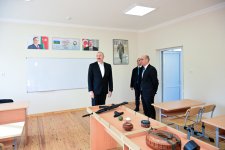 President Ilham Aliyev attends opening of Secondary School No. 1 in Karkijahan settlement after major renovations (PHOTO)