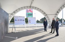 President Ilham Aliyev inspects household waste collection vehicles in Baku (PHOTO)