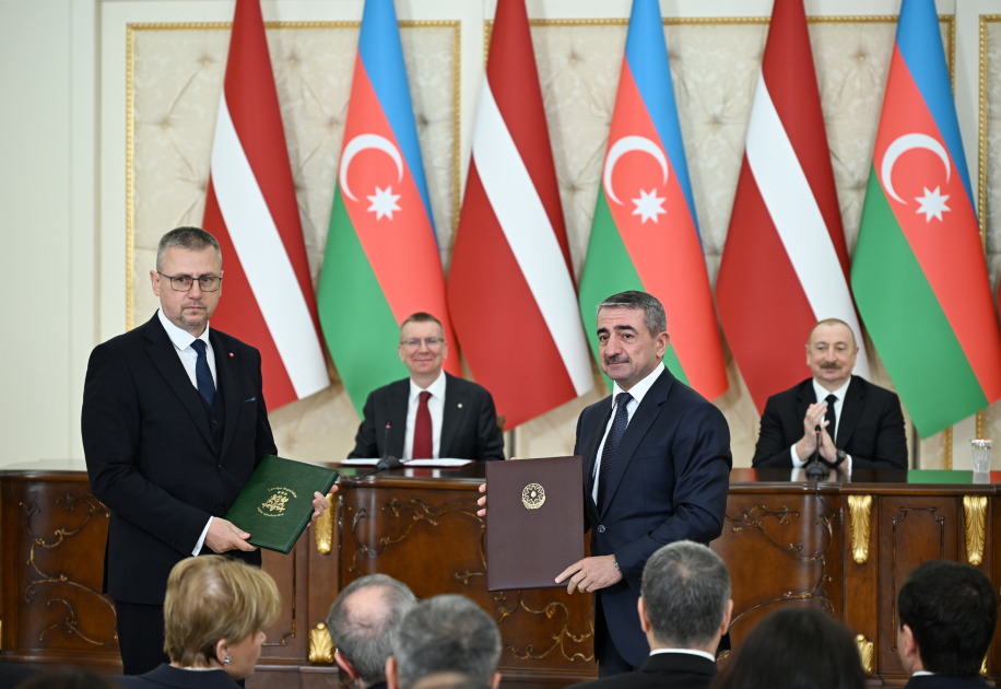 Azerbaijan and Latvia exchange documents (PHOTO)