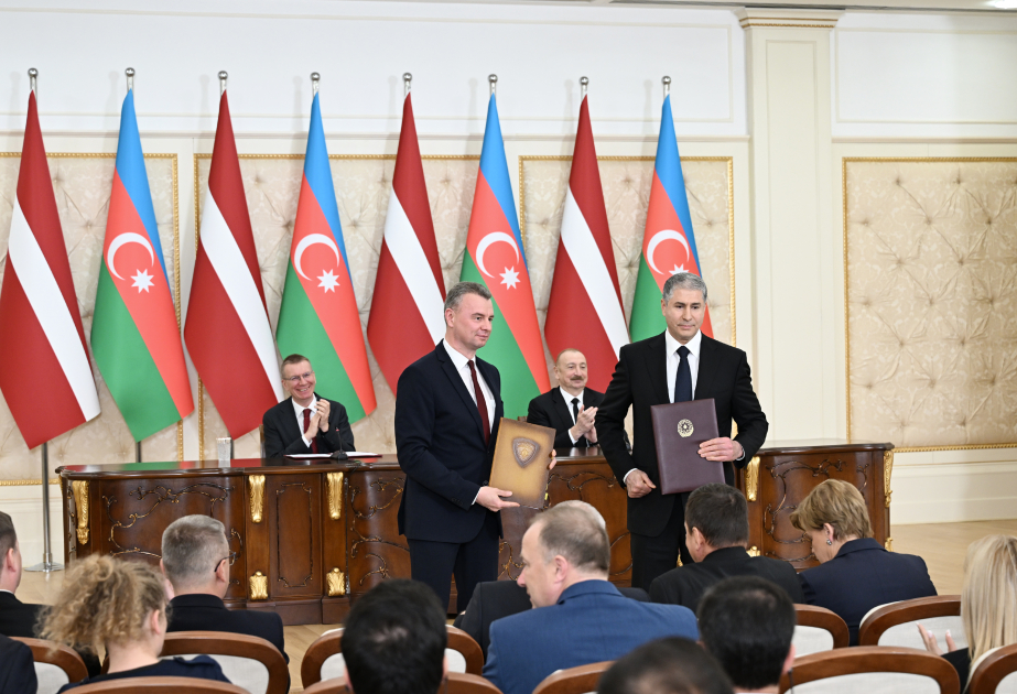 Azerbaijan and Latvia exchange documents (PHOTO)