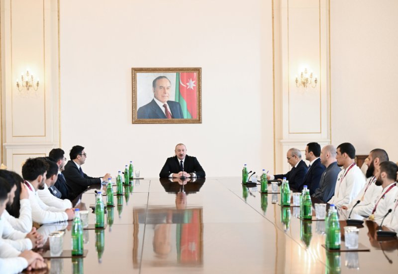 President Ilham Aliyev receives wrestlers who won European Championships in team standings