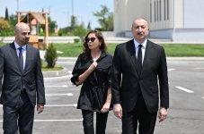 President Ilham Aliyev and First Lady Mehriban Aliyeva view facilities established in private houses in Shukurbayli village (PHOTO)