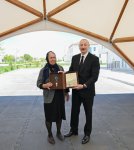 President Ilham Aliyev and First Lady Mehriban Aliyeva meet with residents moving to Shukurbeyli village in Jabrayil district (PHOTO)