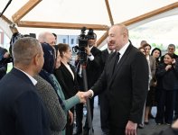President Ilham Aliyev and First Lady Mehriban Aliyeva meet with residents moving to Shukurbeyli village in Jabrayil district (PHOTO)