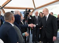 President Ilham Aliyev and First Lady Mehriban Aliyeva meet with residents moving to Shukurbeyli village in Jabrayil district (PHOTO)