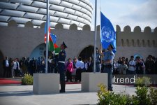 WUF13 hosts ceremony of lowering flags of Azerbaijan and UN (PHOTO)