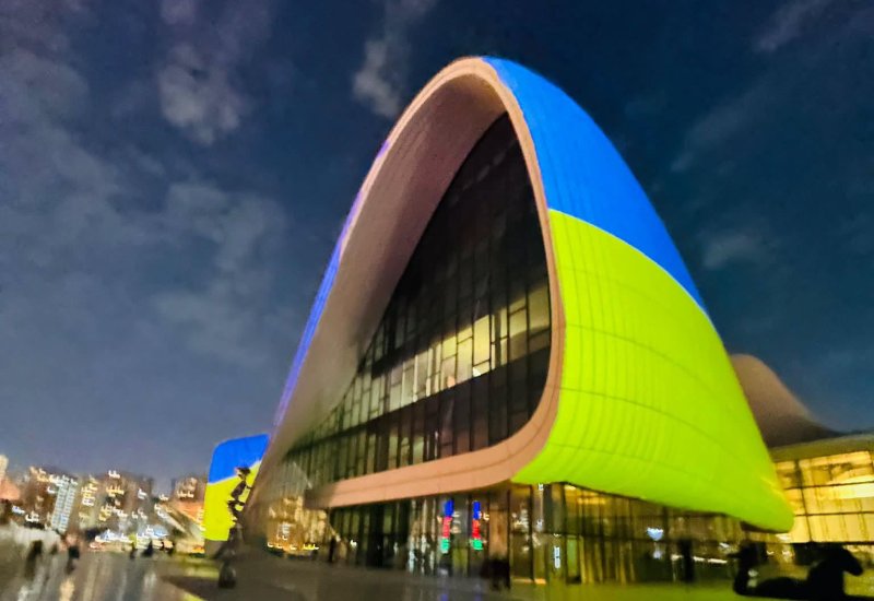 Heydar Aliyev Center illuminated in colors of Ukrainian flag