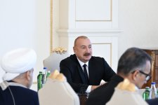 President Ilham Aliyev receives participants of international conferences held in Baku (PHOTO/VIDEO)