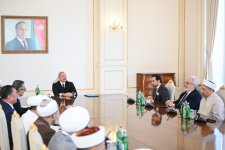 President Ilham Aliyev receives participants of international conferences held in Baku (PHOTO/VIDEO)