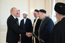 President Ilham Aliyev receives participants of international conferences held in Baku (PHOTO/VIDEO)