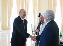 President Ilham Aliyev receives participants of international conferences held in Baku (PHOTO/VIDEO)