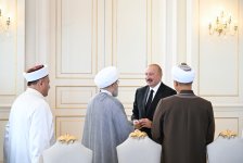 President Ilham Aliyev receives participants of international conferences held in Baku (PHOTO/VIDEO)